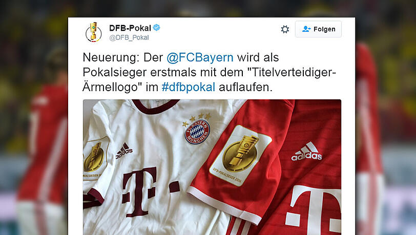 Das neue Titelverteidiger-Emblem auf dem Heim- und Champions-League-Trikot der Bayern. Das neue Titelverteidiger-Emblem auf dem Heim- und Champions-League-Trikot der Bayern.