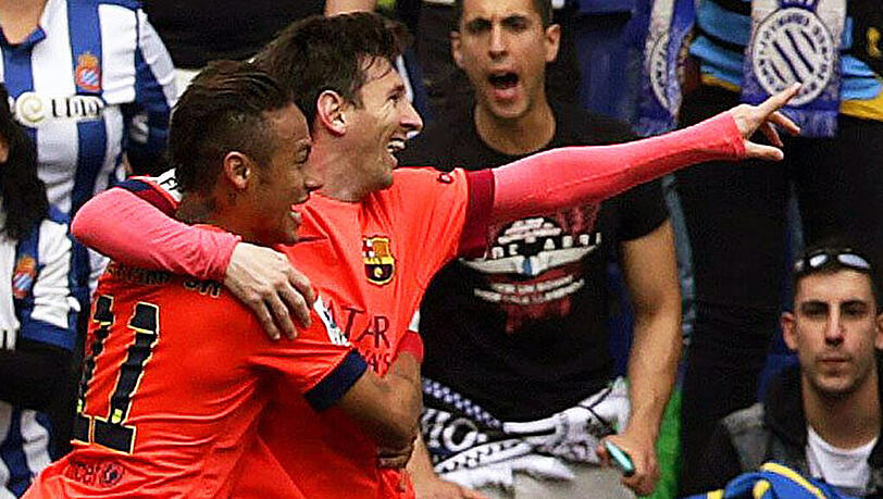 Lionel Messi (r.) und Neymar (l.) erzielten die Tore im Derby gegen Espanyol. Lionel Messi (r.) und Neymar (l.) erzielten die Tore im Derby gegen Espanyol.