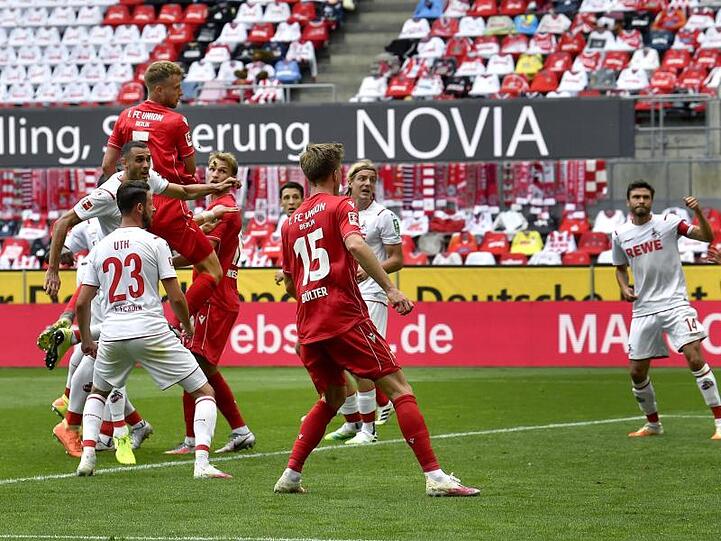 Marvin Friedrich (oben links) brachte Union Berlin mit seinem Tor in Köln auf die Siegerstraße.