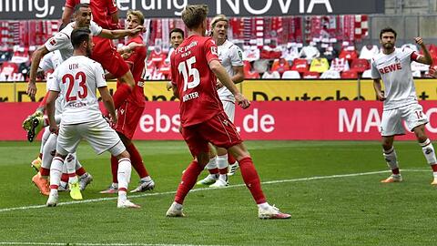 Marvin Friedrich (oben links) brachte Union Berlin mit seinem Tor in Köln auf die Siegerstraße.