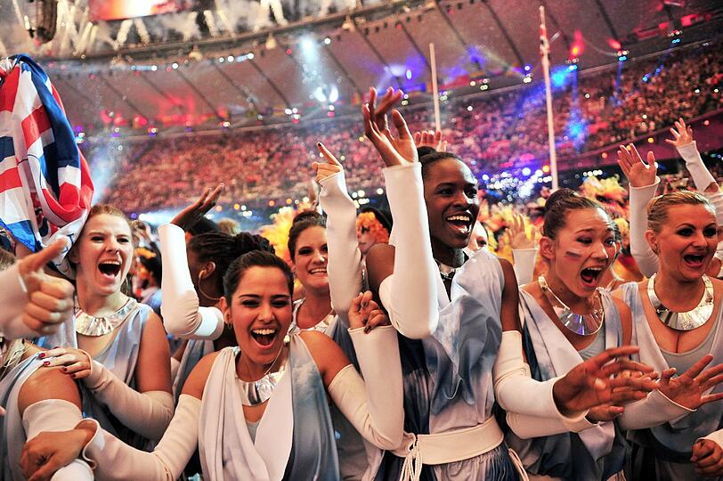 Bei der gigantischen Abschlussfeier der Olympischen Spiele in London heizten Rock- und Popstars wie Queen, George Michael, die Spice Girls und The Who Publikum und Sportlern ein.