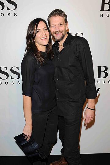 Ihr erster Auftritt als Paar: Bettina Zimmermann und Kai Wiesinger turteln bei der BOSS-Party am Mittwoch in Berlin.