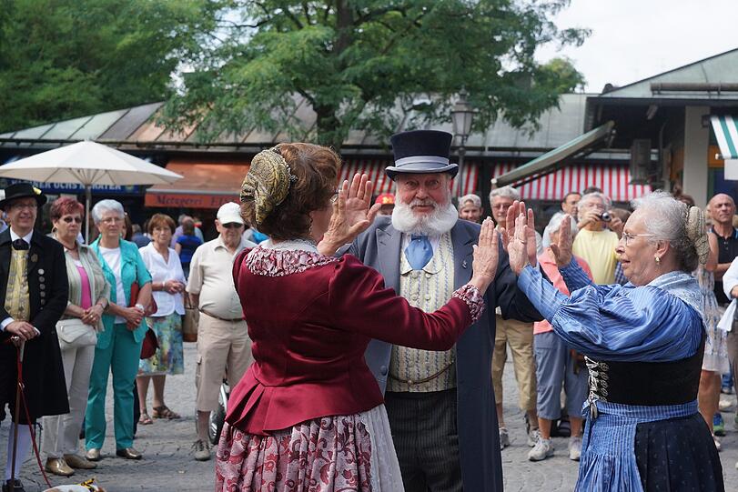 Schausteller, Musiker, Tänzer und Kabarettisten: Die Bilder vom Brunnenfest am Viktualienmarkt.