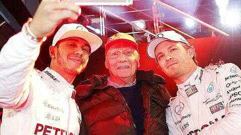 Nico Rosberg (r.) und Lewis Hamilton (l.) mit Niki Lauda im Jahr 2015