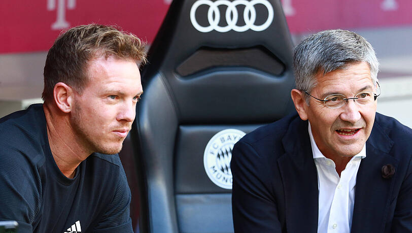Der Druck auf Trainer Julian Nagelsmann (links) ist groß. Klubpräsident Herbert Hainer strahlt Optimismus aus: "Wir sind der FC Bayern und sehen Herausforderungen immer als Chancen - das gehört zur DNA dieses Klubs." (Archivbild)