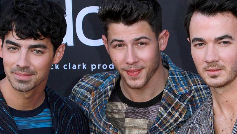 Joe, Nick und Kevin Jonas (v.l.n.r.) spielen 2024 drei Konzerte in Deutschland.