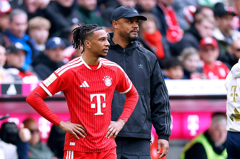 Gutes Team bei Bayern: Olise und Trainer Vincent Kompany (r.). Gutes Team bei Bayern: Olise und Trainer Vincent Kompany (r.).