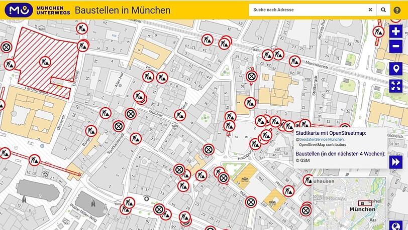 Ganz schön rot hier! Die Icons zeigen tagesaktuell Baustellen und Halteverbote westlich vom Rathaus (große gelbe Fläche links).