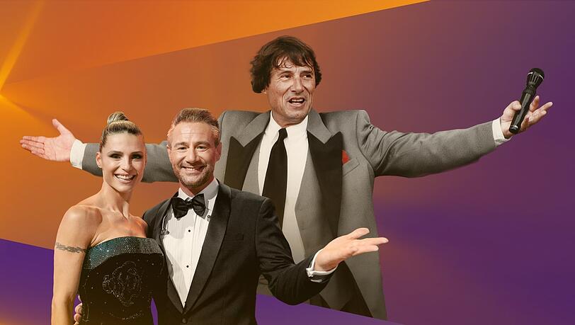 Das Moderatorenduo Michelle Hunziker und Sasha mit Udo Jürgens im Hintergrund. Das Moderatorenduo Michelle Hunziker und Sasha mit Udo Jürgens im Hintergrund.