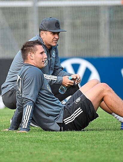 Wieder da: Süle mit Teammanager Oliver Bierhoff.