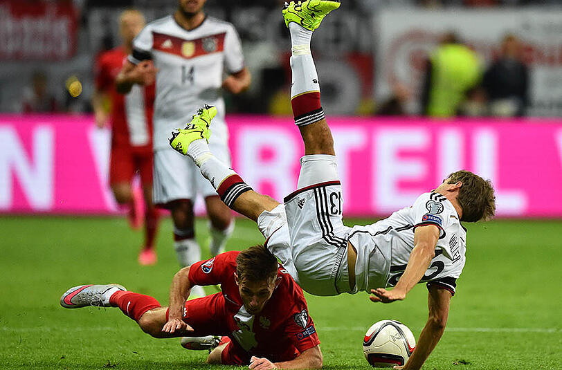Die DFB-Elf gewinnt das wichtige EM-Qualispiel gegen Polen mit 3:1 und ist jetzt ganz nah dran an der Europameisterschafts-Teilnahme. Die Bilder.