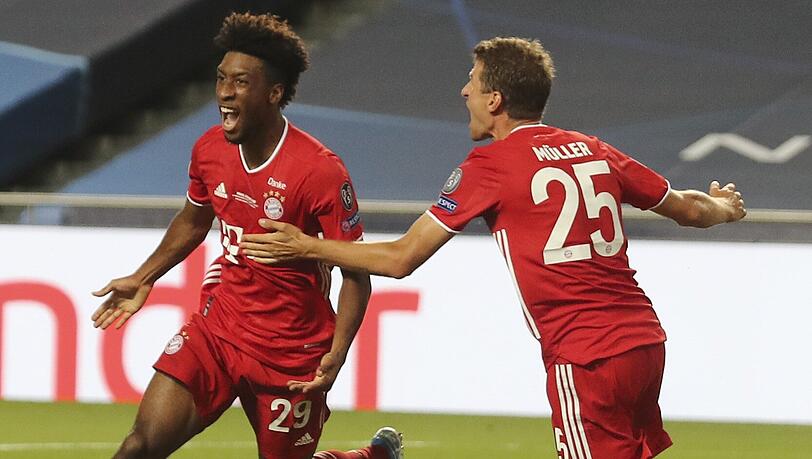 Jubel in Ekstase: Coman lässt sich von Thomas Müller kaum einfangen. Jubel in Ekstase: Coman lässt sich von Thomas Müller kaum einfangen.