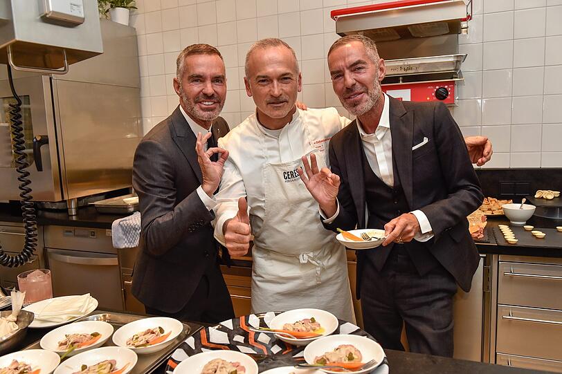 Gastgeber Dean und Dan Caten mit Starkoch Elio Sironi