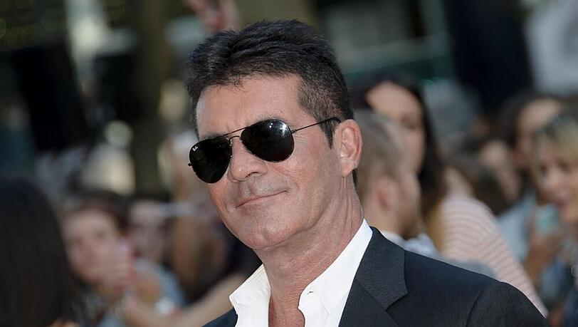 Simon Cowell ist vielbeschäftigt - als Vater und Geschäftsmann Simon Cowell ist vielbeschäftigt - als Vater und Geschäftsmann