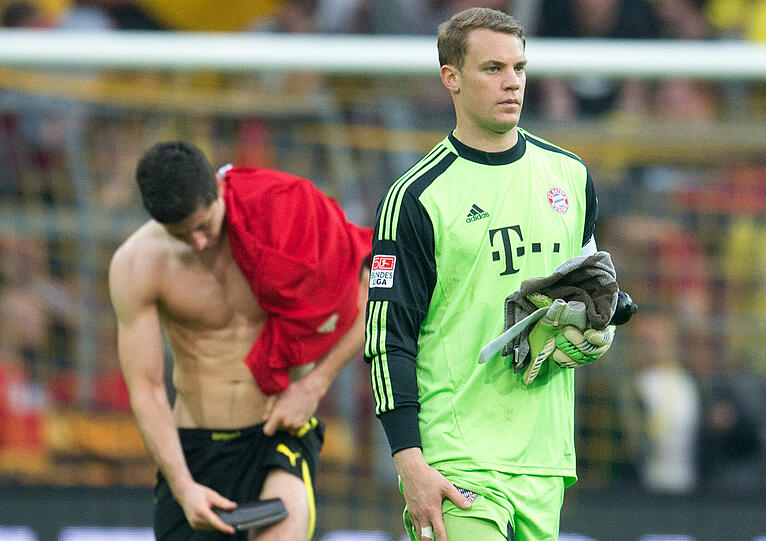 Robert Lewandowski (l.) bereut seine Stimmverteilung bei der Weltfußballerwahl für Ronaldo und gegen Neuer (r.)