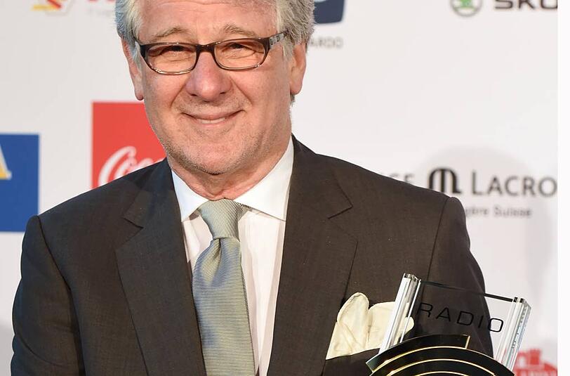 Marcel Reif mit dem Award.