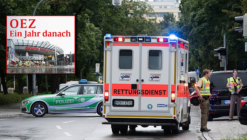 Bereit für den Ernstfall: Polizisten und ein Krankenwagen warten am Abend des Amoklaufes in der Nähe des OEZ auf ihren Einsatz. Bereit für den Ernstfall: Polizisten und ein Krankenwagen warten am Abend des Amoklaufes in der Nähe des OEZ auf ihren Einsatz.