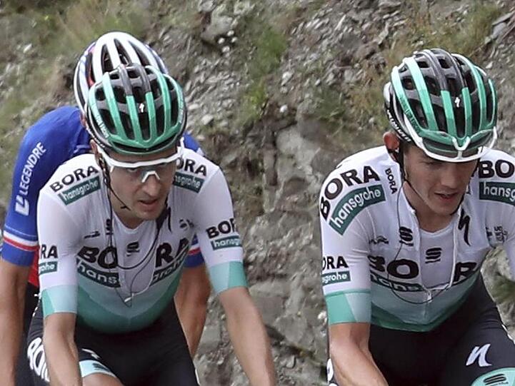 Ist von der starken Entwicklung Emanuel Buchmanns (l) angetan: Gregor Mühlberger (r) vom Team Bora-hansgrohe.