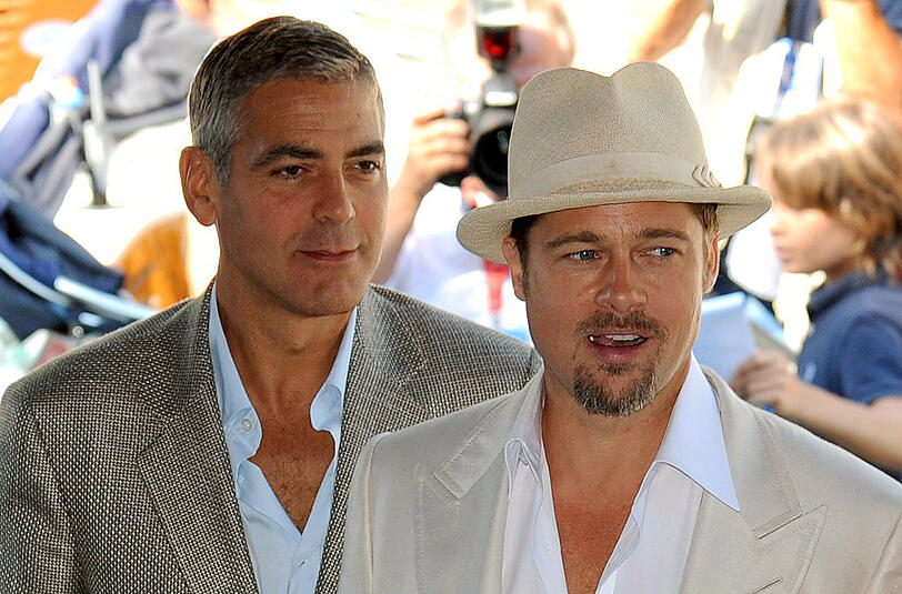 George Clooney und Brad Pitt kommen sich beim Kauf von Drehbüchern regelmäßig in die Quere.