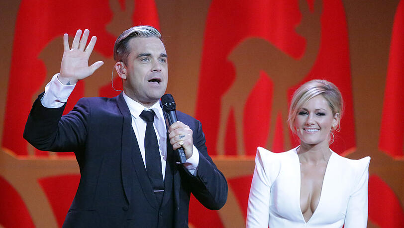 Robbie Williams und Helene Fischer werden 2022 ein Konzert in München geben Robbie Williams und Helene Fischer werden 2022 ein Konzert in München geben