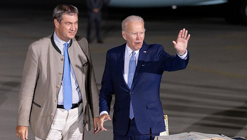 Markus Söder und US-Präsident Joe Biden nach dessen Ankunft am Flughafen München. Markus Söder und US-Präsident Joe Biden nach dessen Ankunft am Flughafen München.
