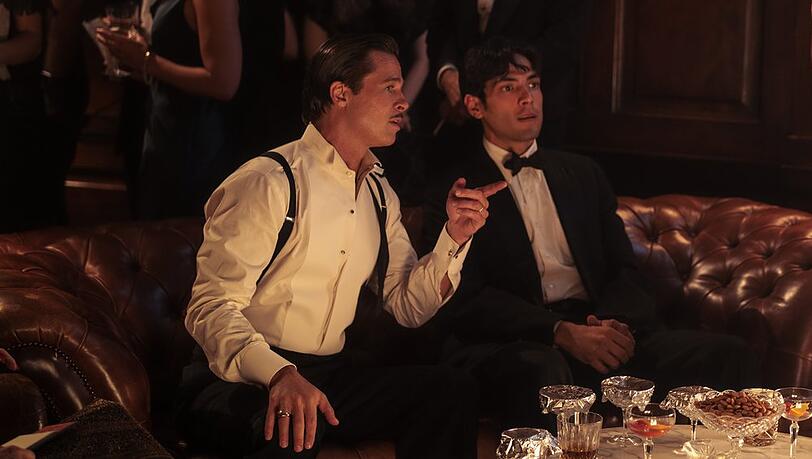 Laut Hollywood-Star Brad Pitt (l.) ging es am Set von "Babylon" hoch her.