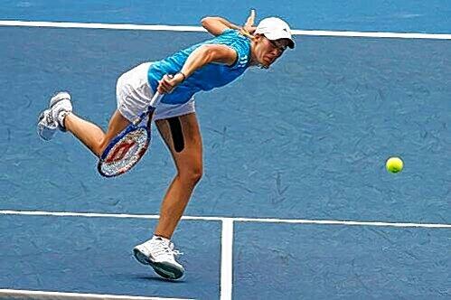Power beim Service: Justine Henin bei ihrem ersten Grand Slam-Auftritt nach dem Comeback.