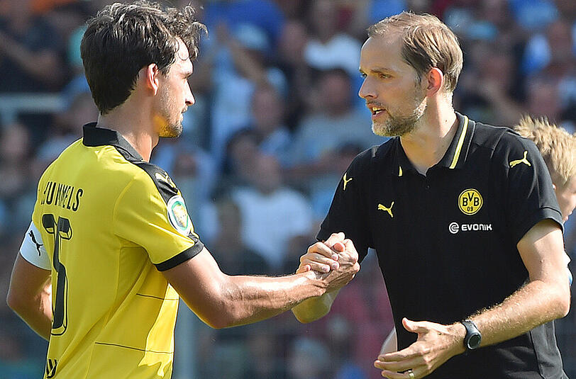 Thomas Tuchel (r.) gönnt Kapitän Mats Hummels in der Europa League eine Pause