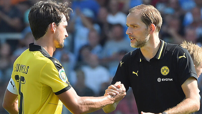 Thomas Tuchel (r.) gönnt Kapitän Mats Hummels in der Europa League eine Pause Thomas Tuchel (r.) gönnt Kapitän Mats Hummels in der Europa League eine Pause