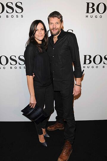 Ihr erster Auftritt als Paar: Bettina Zimmermann und Kai Wiesinger turteln bei der BOSS-Party am Mittwoch in Berlin.