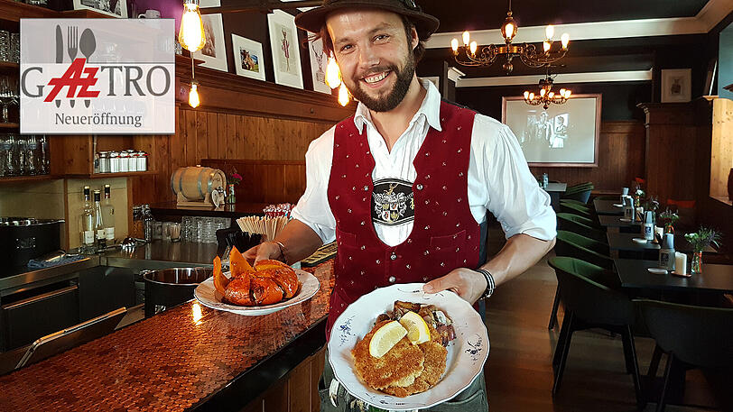 Der Betriebsleiter ist am Gamsbart erkennbar: Jakob Portenlänger mit dem mächtigen Vorspeisenkürbis und dem Münchner Schnitzel.