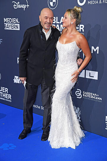 Christian Neureuther ließ sich mit Evelyn Burdecki ablichten.
