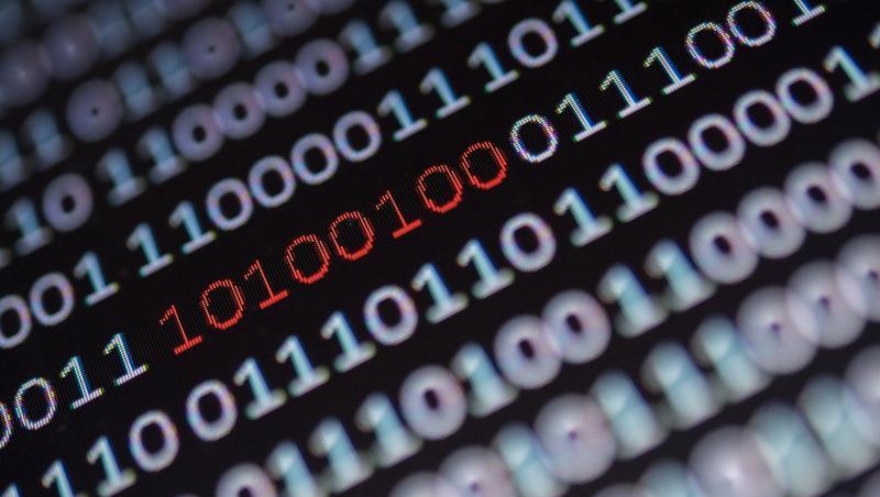 Ein Binärcode, von dem ein Segment rot eingefärbt ist, steht auf einem Bildschirm. Foto: Sebastian Gollnow/Archiv Ein Binärcode, von dem ein Segment rot eingefärbt ist, steht auf einem Bildschirm. Foto: Sebastian Gollnow/Archiv