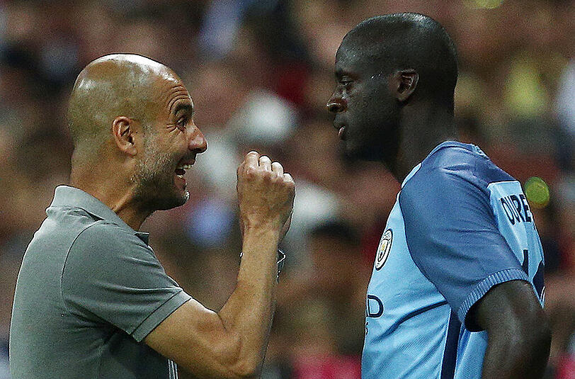 Sollen seit Jahren ein angespanntes Verhältnis zueinander haben: Manchester City-Trainer Pep Guardiola (l.) und Yaya Touré.