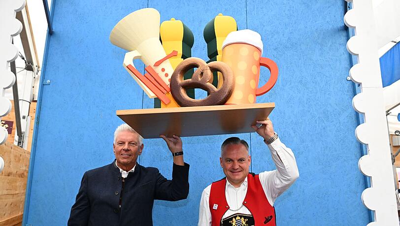 Oberbürgermeister Dieter Reiter (SPD) (l) und Wiesnchef Christian Scharpf.
