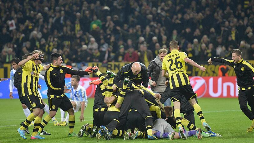 Das Wunder von Dortmund: Der BVB besiegt Malaga, dreht innerhalb von 96 Sekunden ein 1:2 in einen 3:2 Das Wunder von Dortmund: Der BVB besiegt Malaga, dreht innerhalb von 96 Sekunden ein 1:2 in einen 3:2
