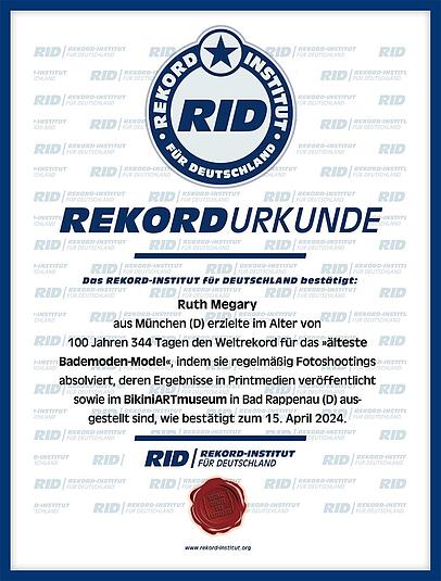 Die offizielle Urkunde des Rekord-Institut für Deutschland (RID), welche Ruth Megary als ältestes Bademodenmodel der Welt zertifiziert. Die offizielle Urkunde des Rekord-Institut für Deutschland (RID), welche Ruth Megary als ältestes Bademodenmodel der Welt zertifiziert.