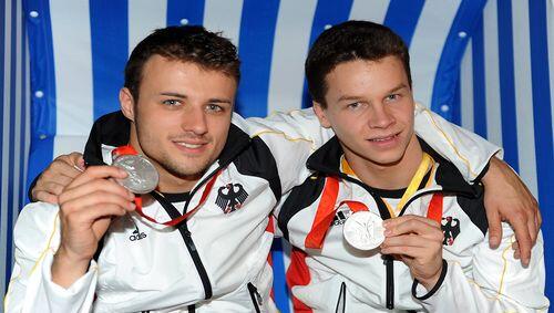 Getrennt trainieren, gemeinsam triumphieren: Patrick Hausding (vorn) und Sascha Klein mit ihrer Silber-Medaille. Getrennt trainieren, gemeinsam triumphieren: Patrick Hausding (vorn) und Sascha Klein mit ihrer Silber-Medaille.
