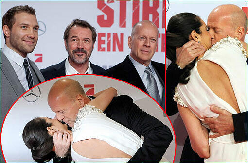 So zärtlich sieht man den Action-Star selten: Auf der Premiere zu seinem neuen "Stirb langsam"-Film knutschte Bruce Willis verliebt mit seiner Ehefrau Emma. Die Bilder vom roten Teppich am Montagabend in Berlin.