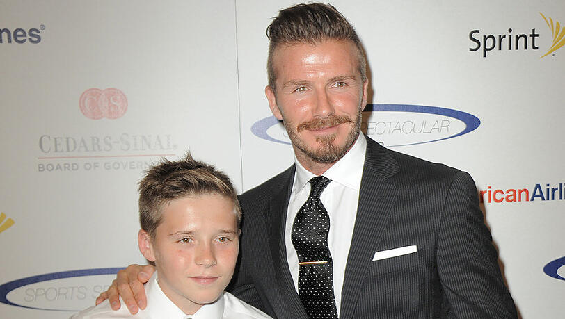 Routiniers auf dem roten Teppich: David Beckham und sein Sohn Brooklyn Routiniers auf dem roten Teppich: David Beckham und sein Sohn Brooklyn