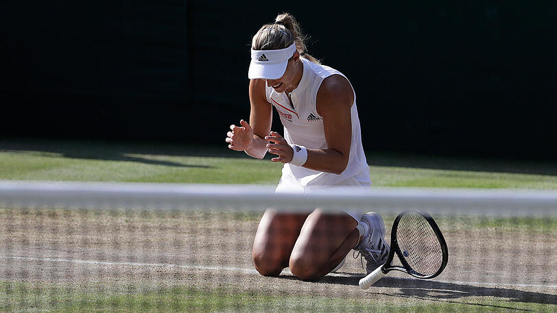 Sie kann es nicht fassen: Angelique Kerber hat als erste Deutsche seit 22 Jahren den Grand-Slam-Klassiker in Wimbledon gewonnen.