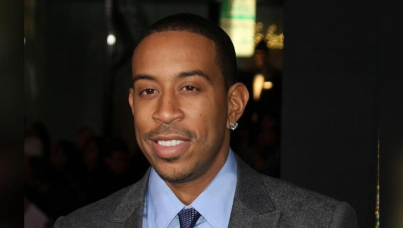 Ludacris spricht den Vater in der Serie "Karmas Welt".