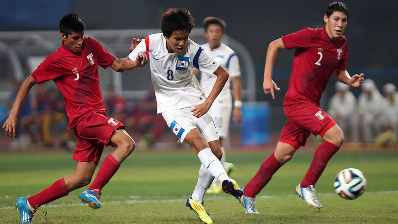 Wooyeong Jeong (Mitte) bei den "Youth Olympic Games" 2014 in Nanjing.
