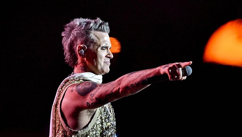 Robbie Williams auf der Bühne und in seinem Element - derzeit ist der Sänger in Down Under unterwegs. Robbie Williams auf der Bühne und in seinem Element - derzeit ist der Sänger in Down Under unterwegs.