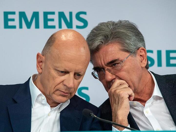 Finanzvorstand Ralf Thomas (l.) und Siemens-Chef Joe Kaeser bei der Vorlage der Quartalszahlen.