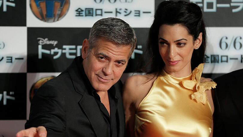 Wo sie auch hingehen, sind alle Augen auf George Clooney und seine schöne Frau Amal gerichtet Wo sie auch hingehen, sind alle Augen auf George Clooney und seine schöne Frau Amal gerichtet