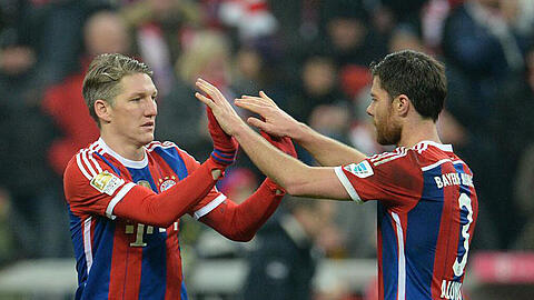 Die Alphatiere im Mittelfeld des FC Bayern: Bastian Schweinsteiger (l.) und Xabi Alonso (r.).
