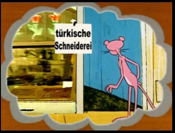 Der Screenshot zeigt einen Ausschnitt aus dem Video des Nationalsozialistischen Untegrundes (NSU): In dem Film mit der Trickfilmfigur "Paulchen Panther" werden Fotos der Mordopfer der vergangenen Jahre gezeigt, zu denen sich die Terrorgruppe bekannte.