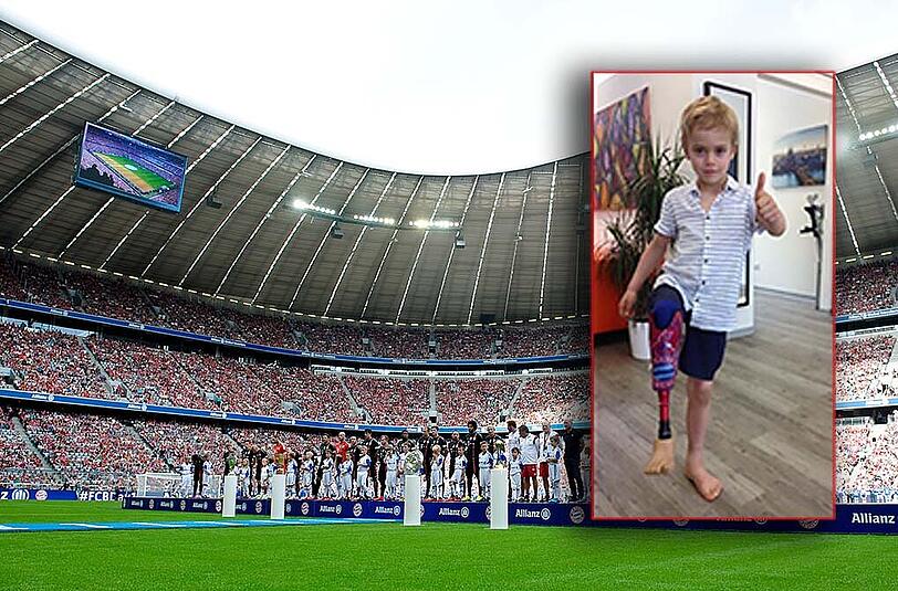 Ein Traum wird wahr: Der kleine Lenny darf mit seinen Bayern-Idolen in die Allianz Arena einlaufen.