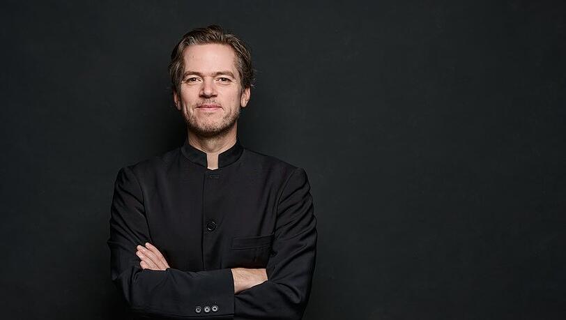 Der Chorleiter und Dirigent Florian Helgath.